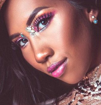 Carnival make-up with rhinestones and pink lips